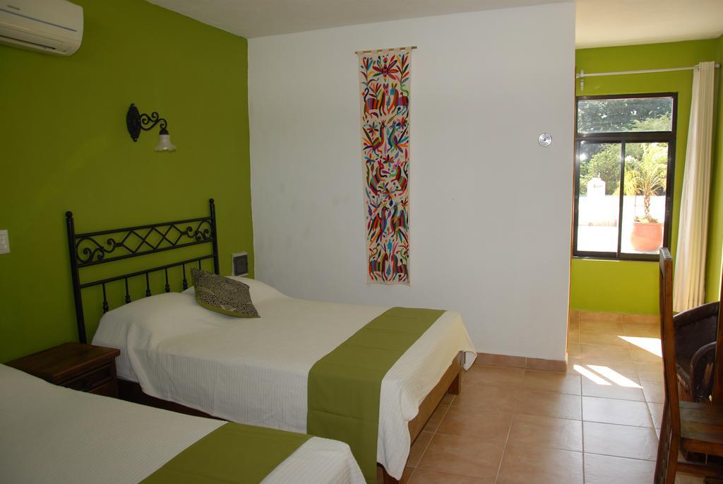 Hotel Aries Y Libra Mérida Habitación foto